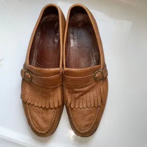 Allen Edmonds Woodville tan slip on loafers with fringe &amp; buckle