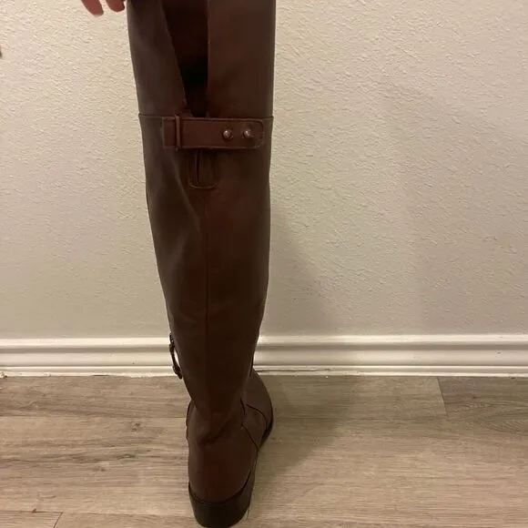 BCBG MaxAzria brown leather over the boots