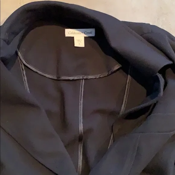 Black riding jacket, amazing w jeans and boots