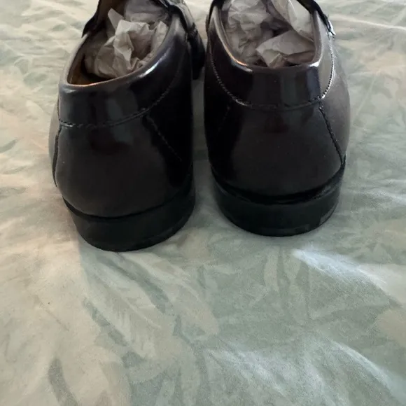 Brand new Cole Haan Black Leather Slip-On Loafers with Tassels