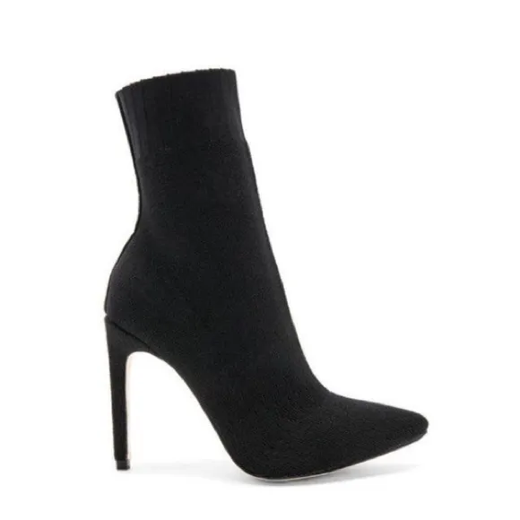 Chrissy Teigen X Revolve delta boots By Delta
