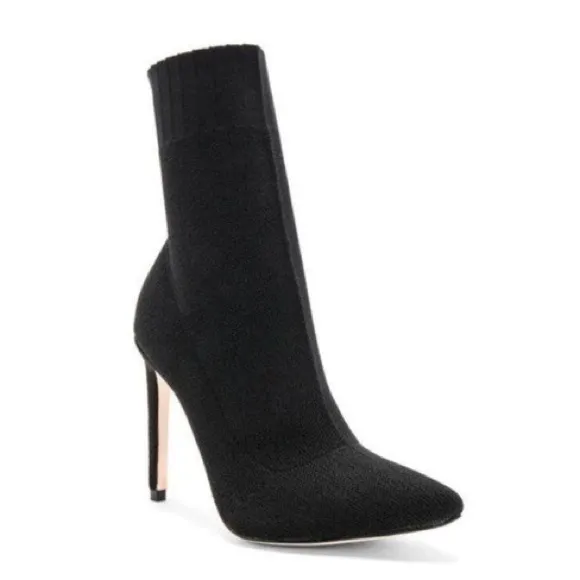 Chrissy Teigen X Revolve delta boots By Delta