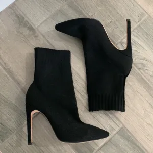 Chrissy Teigen X Revolve delta boots By Delta