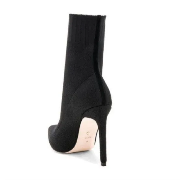 Chrissy Teigen X Revolve delta boots By Delta