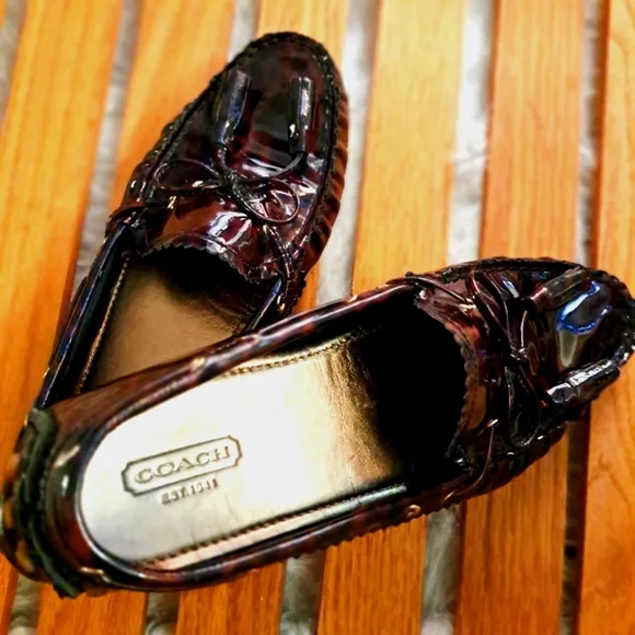 Coach Patent Loafer. Animal Print design. Tassels. Size 7 1/2 B.