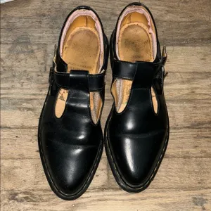 Dr. Martens Black Leather Loafers with Slip-On Design