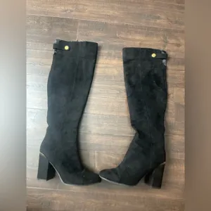 Excellent condition knee high boots.