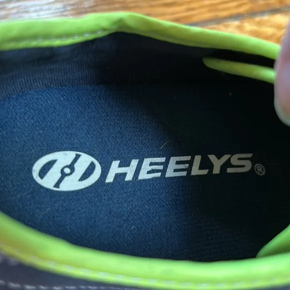 Heely’s brand canvas blue/green wheeled shoes. Youth size 4. Excellent condition