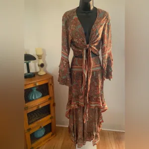 India Boutique Boho Bell Sleeve Front Tie Top and High Low Maxi Skirt Set.