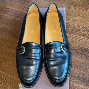 Johnston &amp; Murphy Cellini black leather slip on loafers with buckle detailing
