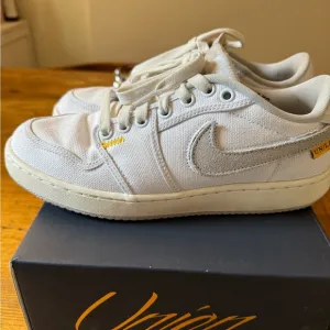 Jordan Women's Sneakers in White and Yellow
