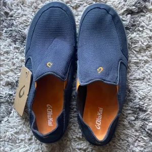 NWT Olukai Nohea Mesh Men’s Slip On Shoes Dark Shadow