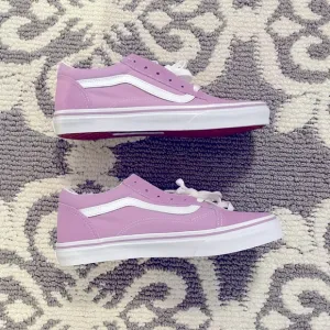 Purple Vans sneakers