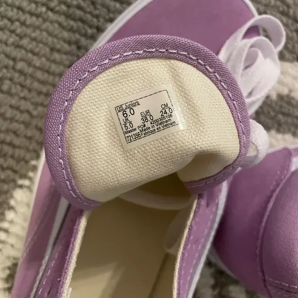 Purple Vans sneakers