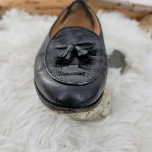 Salvatore Ferragamo black tasseled loafers leather