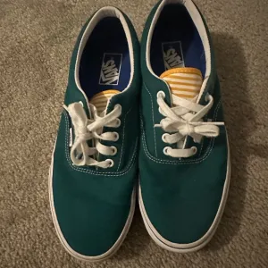 Vans Green and White Sneakers with Classic Design