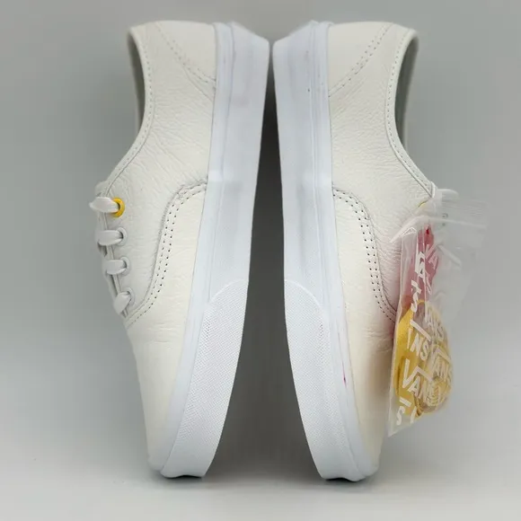 Vans White Canvas Sneakers with Gold Eyelets