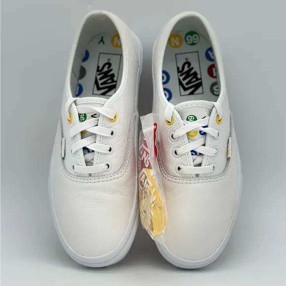 Vans White Canvas Sneakers with Gold Eyelets