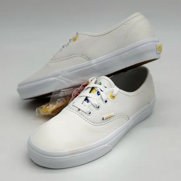 Vans White Canvas Sneakers with Gold Eyelets