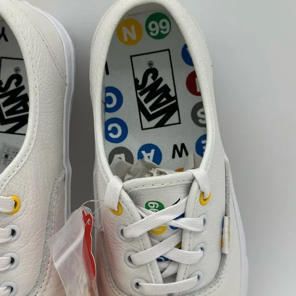 Vans White Canvas Sneakers with Gold Eyelets