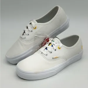 Vans White Canvas Sneakers with Gold Eyelets
