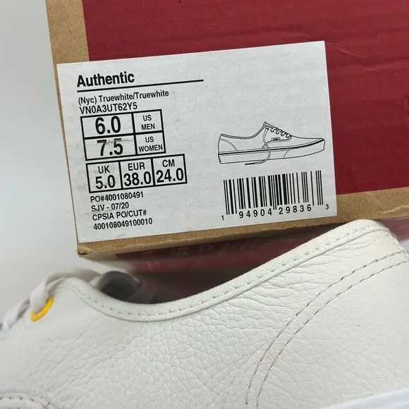 Vans White Canvas Sneakers with Gold Eyelets