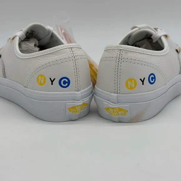 Vans White Canvas Sneakers with Gold Eyelets
