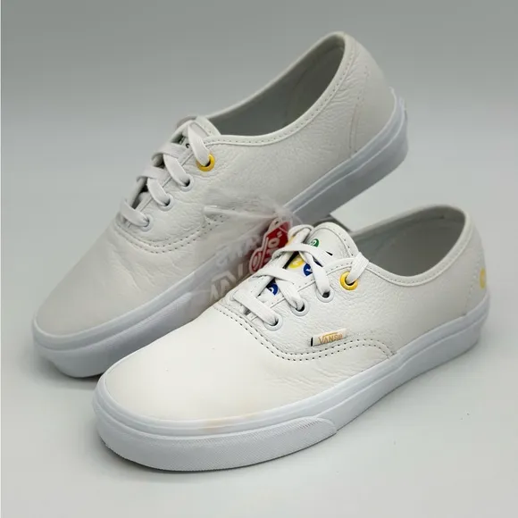 Vans White Canvas Sneakers with Gold Eyelets