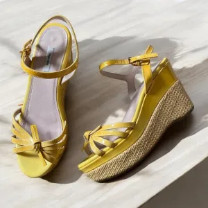 Vibrant Yellow Wedge Sandals with Twisted Design and Ankle Strap