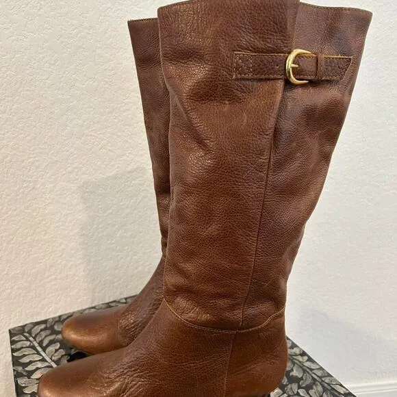 Whiskey Brown leather knee-high riding boots with a buckle to adjust calf
